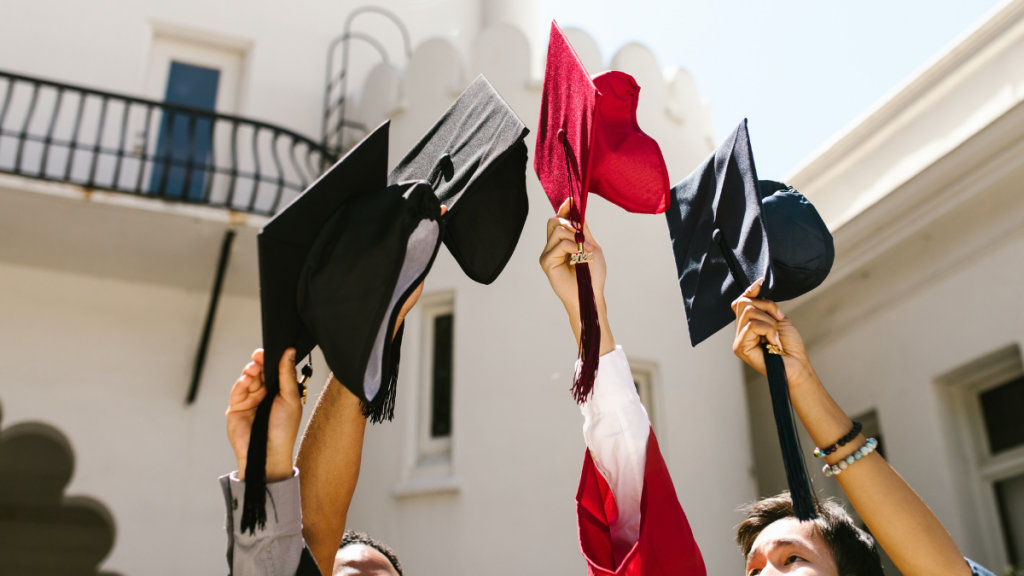 ai in higher education students holding graduation caps
