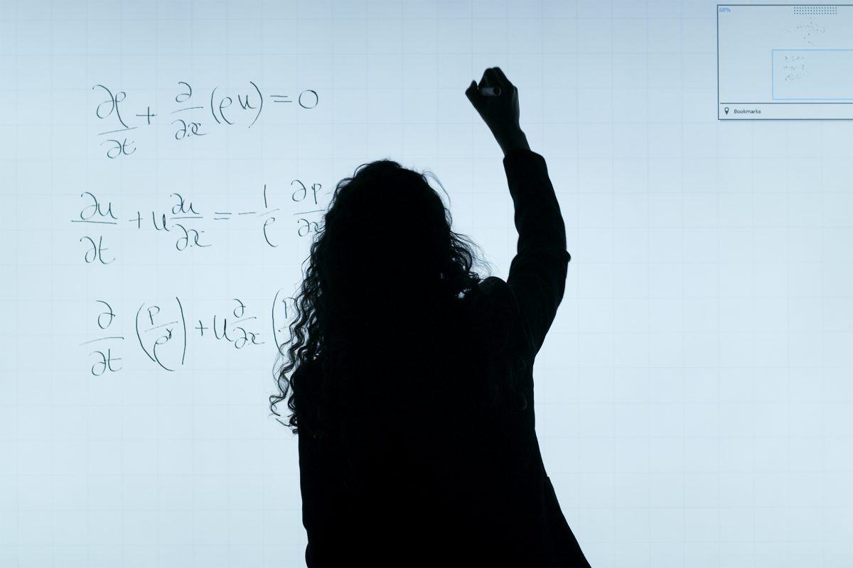 woman math board | ai in mathematics