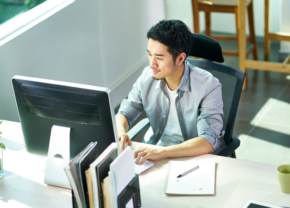 businessman on computer restrictions